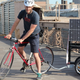 Illustration for article titled This Apocalypse-Ready Solar Charging Station Folds Up Behind a Bike